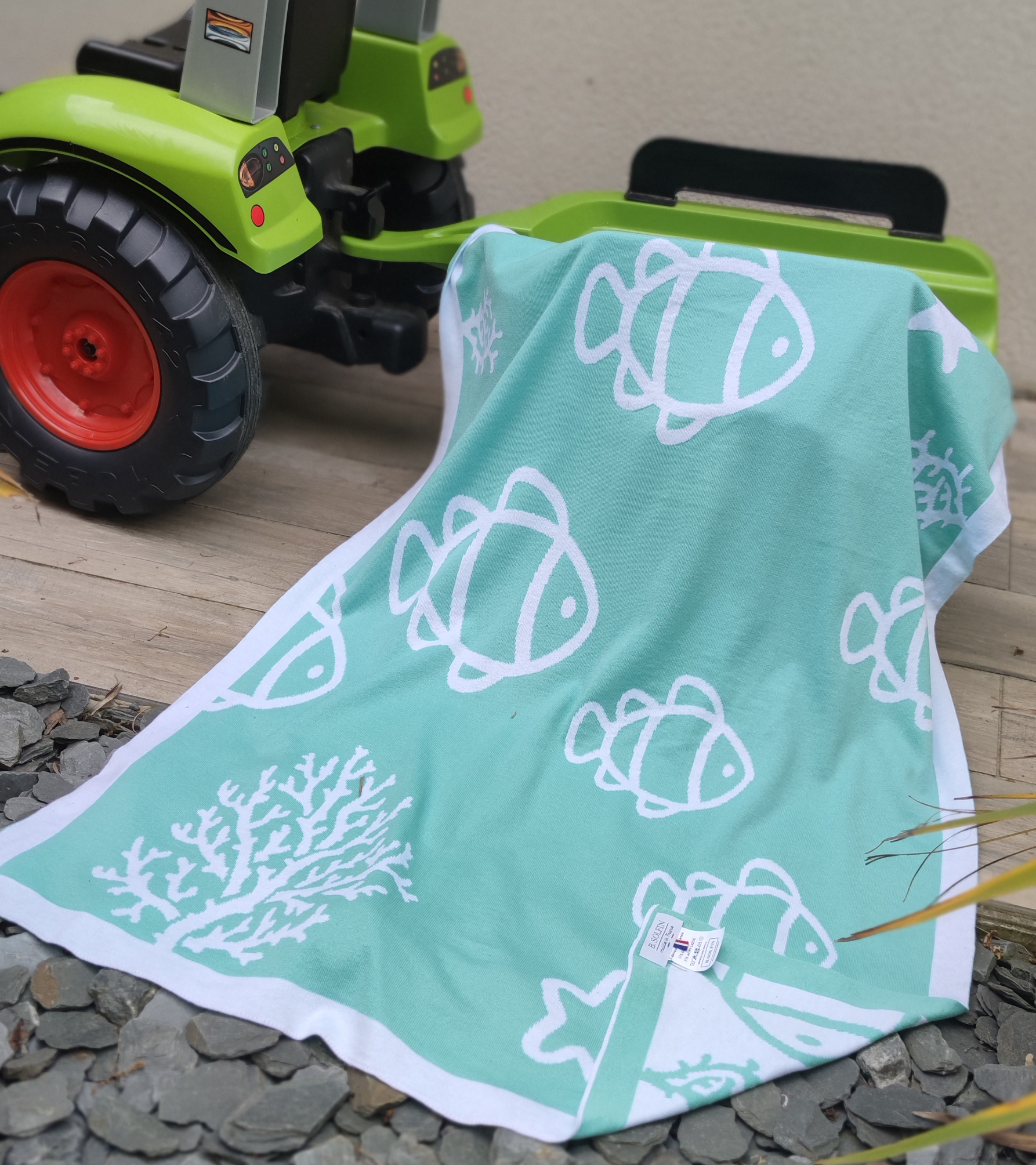 La Couverture bébé motif poisson vert aqua
